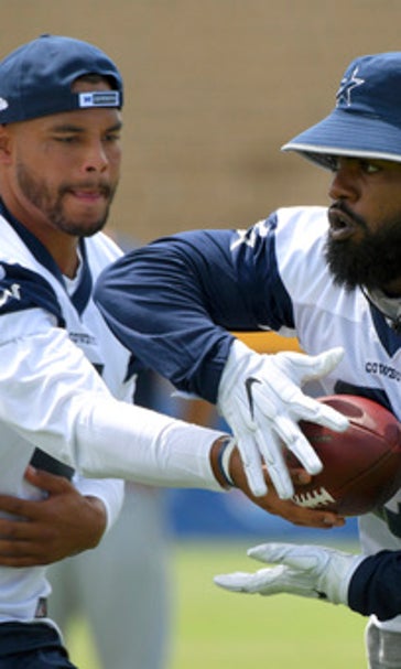Cowboys' Elliott smiles for fans, shuns media as issues loom